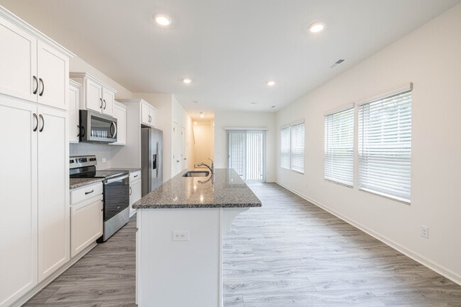 Building Photo - Beautiful 3 Bedroom Townhome Main Street Downtown Pineville - MOVE IN READY