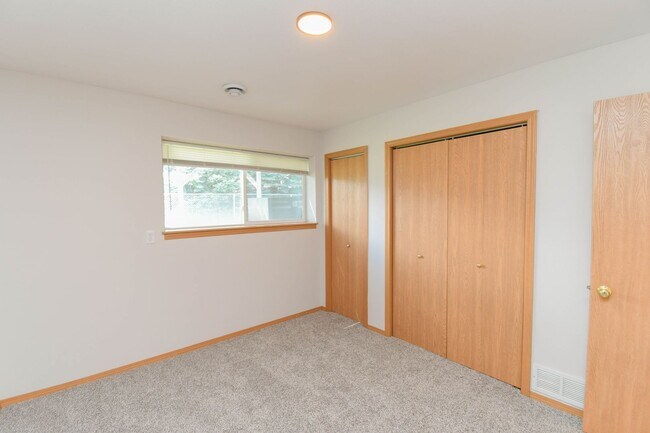 Building Photo - Updated 3BR Split-Level Home with Huge Deck, Fenced Yard & 2-Car Garage Near I-29!