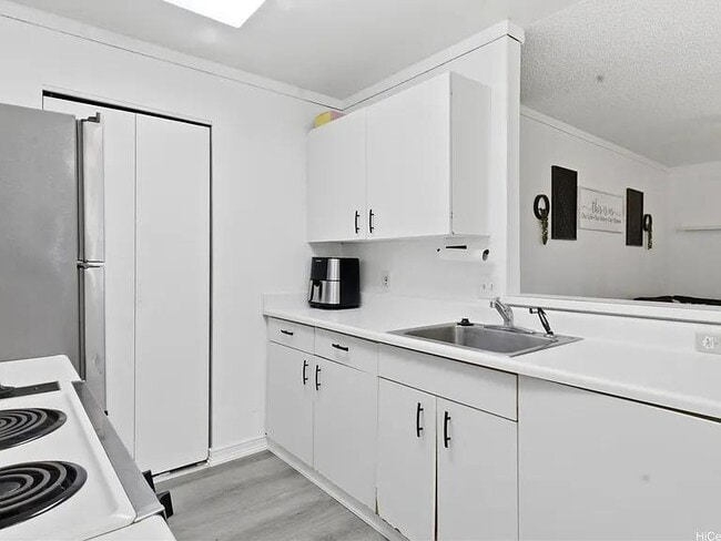 Building Photo - 94-205-205 Lumiaina Pl