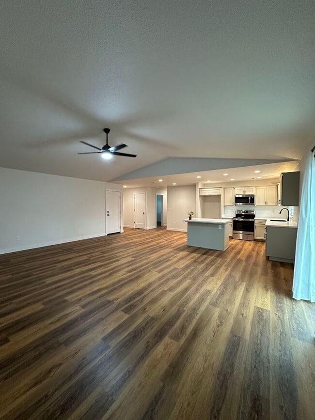Building Photo - Updated Home with Island Kitchen, LVP Flooring, and Yard Care Included!