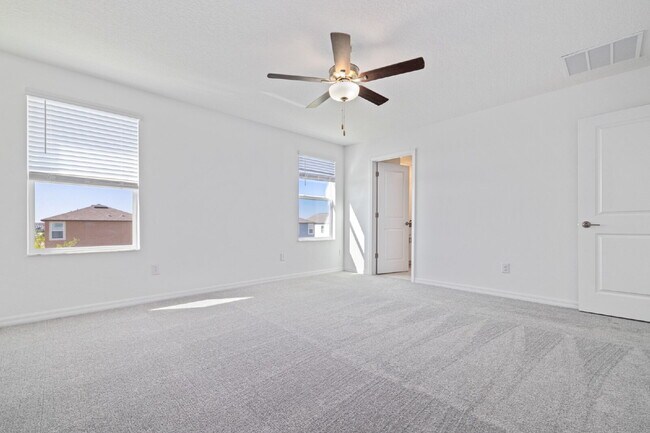 Building Photo - "Spacious 5-Bed Gem in Epperson community ...