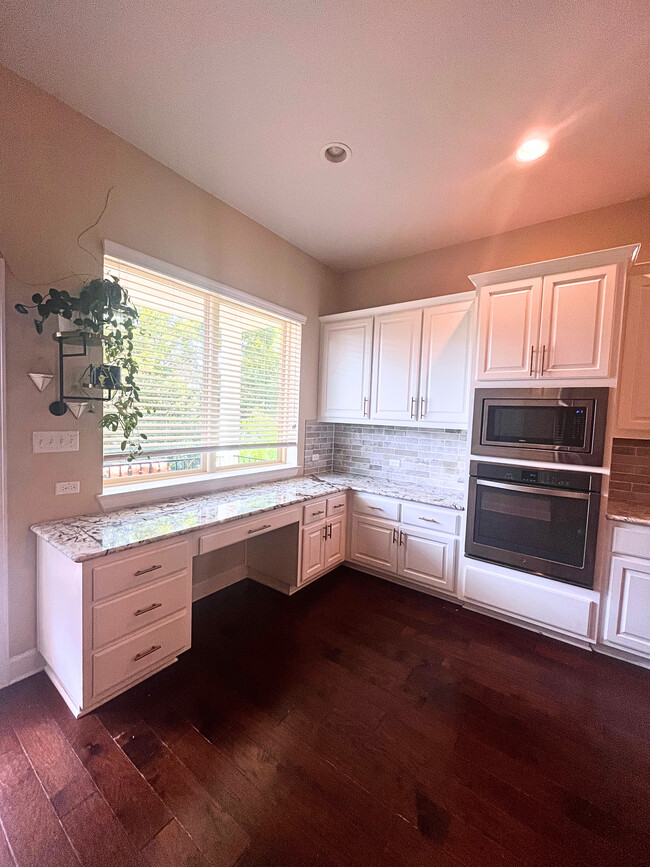 Kitchen with built in desk space - 5704 Alonso Dr