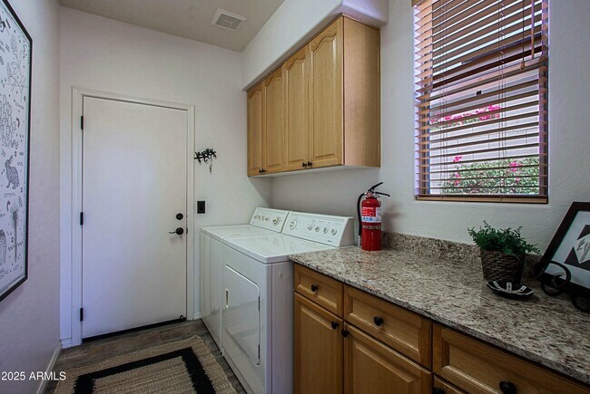 Building Photo - 6879 E Amber Sun Dr
