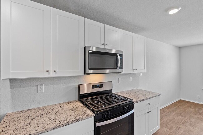 Building Photo - RESORT STYLE AMENITIES!! Multiple Pools. Lazy River. Splash Pad and Water Slides. Fitness Center....