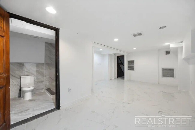 Building Photo - Timelessly Renovated Historic Triplex with...