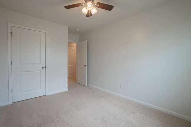 Building Photo - Partially furnished and now available!