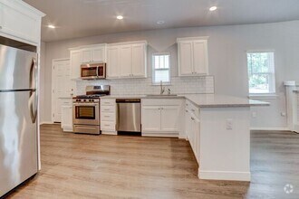 Building Photo - 1/1 Duplex Near TU With Large Fenced Yard!