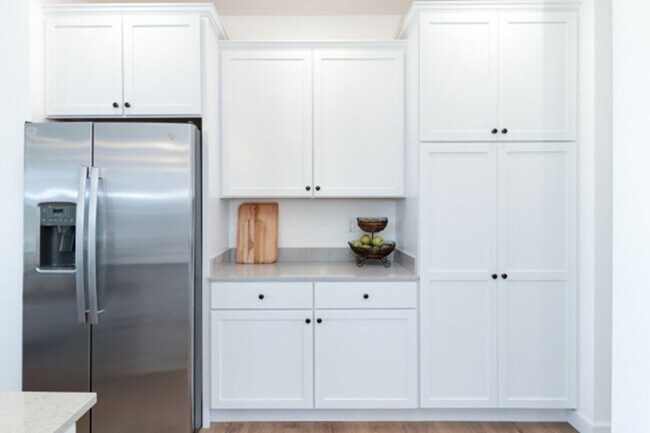 Building Photo - Save $1,000 off your security deposit AND ...