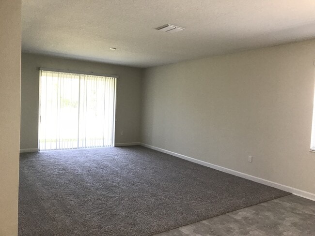 Building Photo - NEWER 3/2 Plus Den Home at The Oaks in Mos...