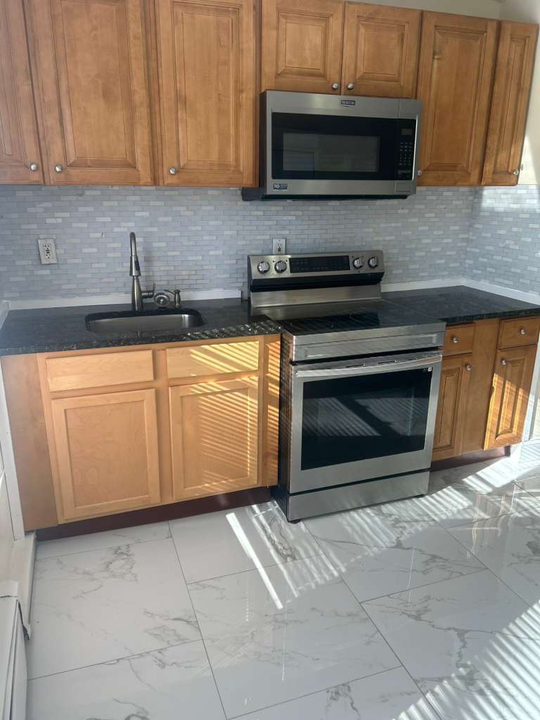 Updated flooring in kitchen - 24 Garden St