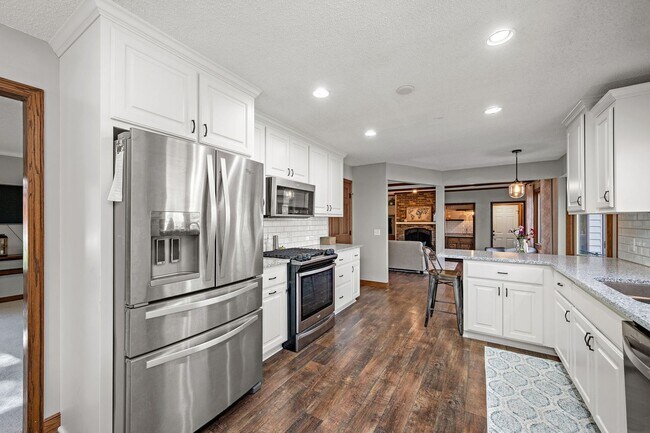 Building Photo - Stunning Remodeled 4BR Home w/ Pond View & 3-Seasons Porch!