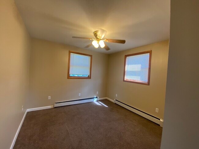 Building Photo - Beautiful secluded 4 bedroom 2.5 bath home with 2 stall detached garage and descent sized yard