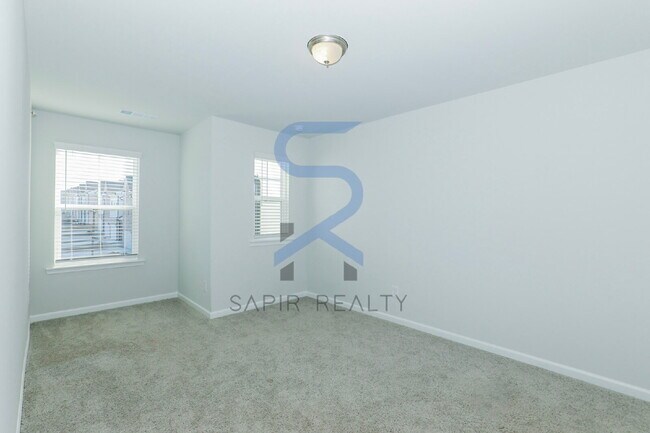 Building Photo - Move in before February 28th and choose your reward: a $250 Amazon Gift Card or a 55" Smart TV!