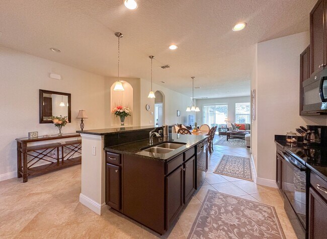 Building Photo - Furnished Rental in Golf Cart District!