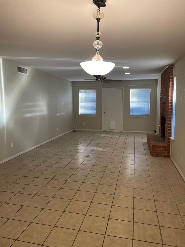 Building Photo - 2 bedroom duplex!  2 bath, 2 car carport
