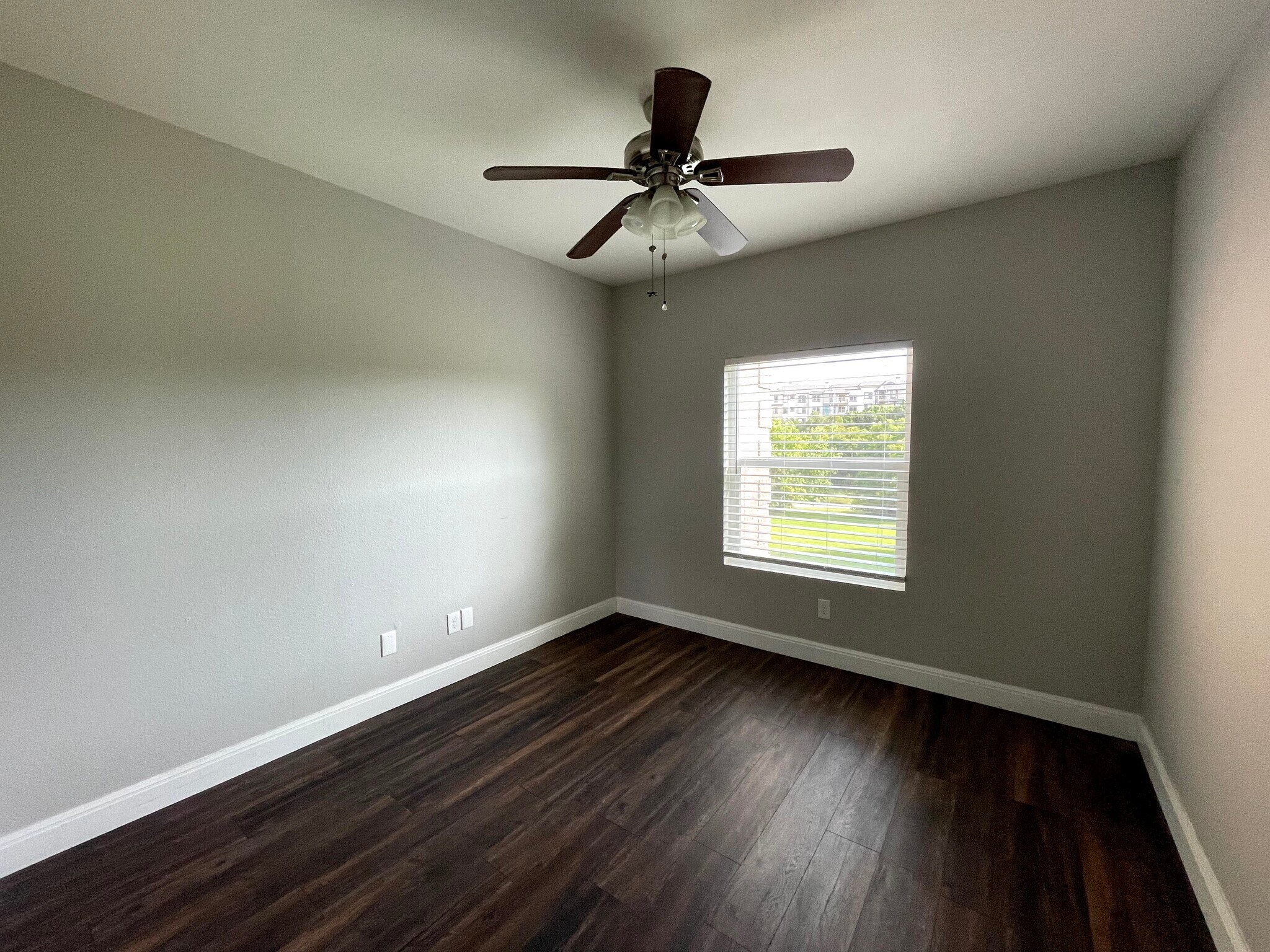 Guest bedroom with a view of the park - 12166 Metric Blvd
