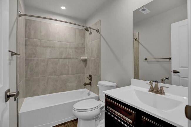 Building Photo - Luxury 4-Story Townhome with Rooftop Terrace!