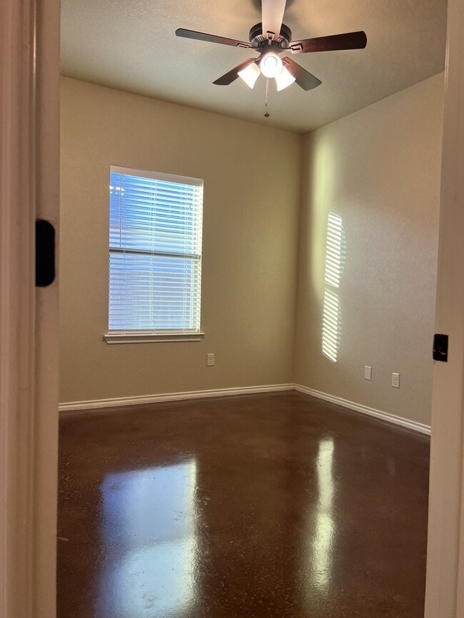 Building Photo - 3 Bedroom Duplex with Stained Concrete Floors and Greenbelt Views!