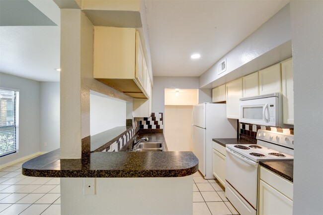 Building Photo - 7200 W T C Jester Blvd