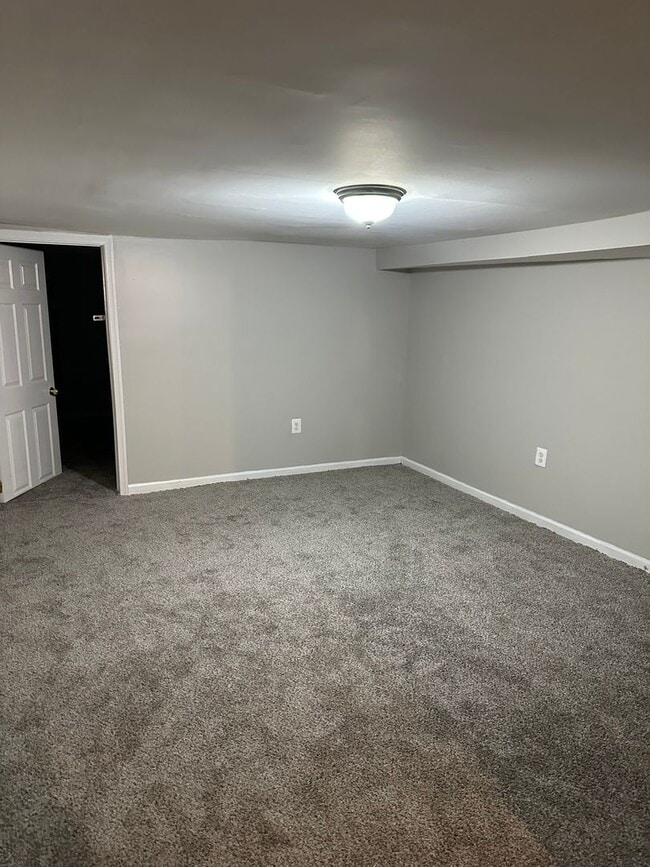 Building Photo - Spacious, Newly Renovated Home! Central Air! Finished Basement! W/D! Double Level Rear Deck! Avai...