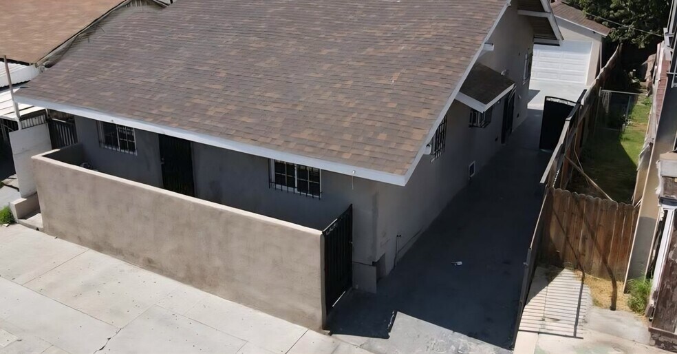 Building Photo - 1235 W Florence Ave