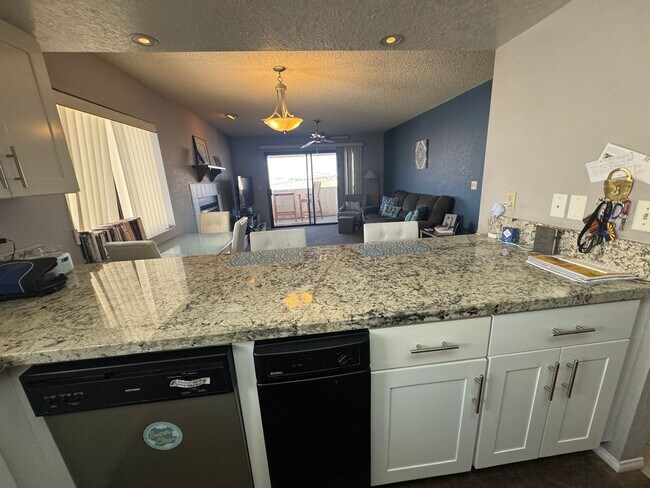 Building Photo - FURNISHED 2BR CONDO w/Utilities Water View Gated NO STAIRS