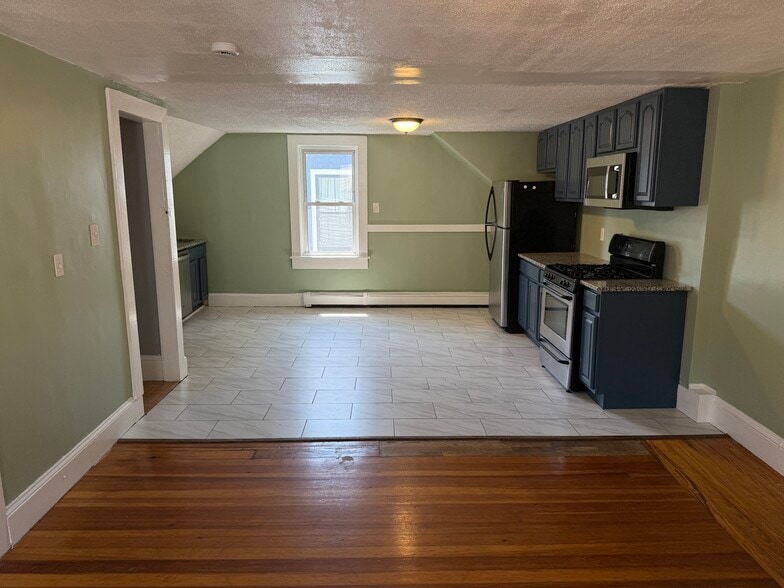 Apt 3: Kitchen/Dining Area - 57 Mozart St
