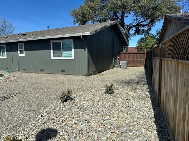 Building Photo - Updated Home with Island Kitchen, LVP Flooring, and Yard Care Included!
