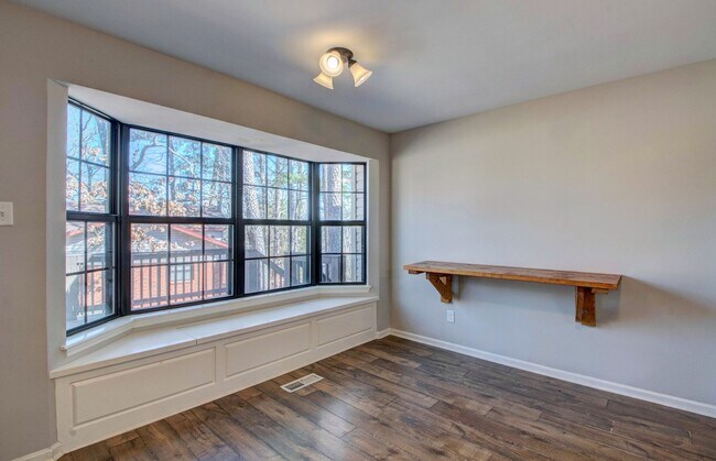 Building Photo - Welcome Home: Charming Brick Beauty with Covered Porch.