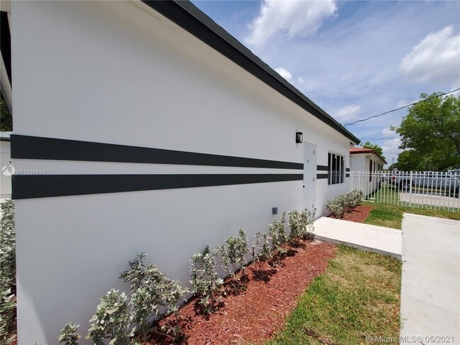 Building Photo - 8028 NW 11th Ave