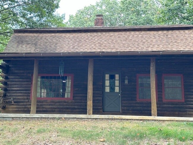 Building Photo - Country Charmer-4 Bedroom Log Home