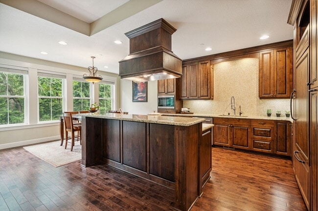 Building Photo - 2 Creeks Condominiums - Gated Community on...