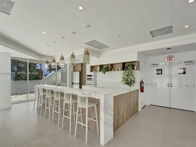 Building Photo - 5900 Collins Ave