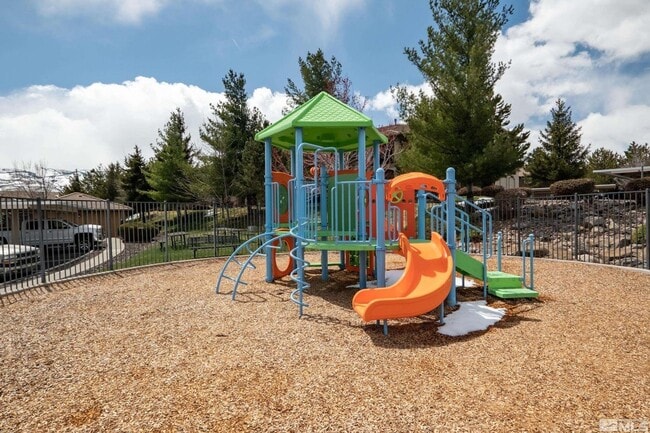 Building Photo - Discover Your Dream Condo with Stunning Mountain Views a 1 Car Garage & Covered carport in NW Ren...