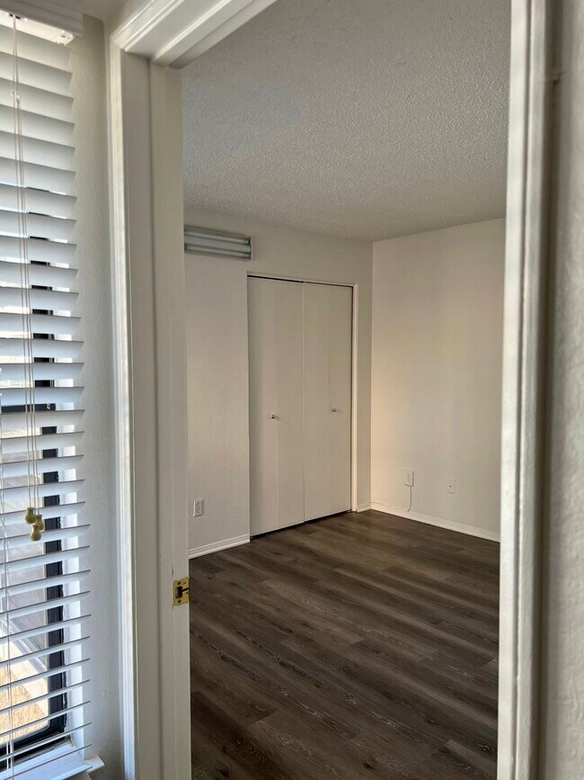 Second bedroom with wall to wall closets - 10655 Lemon Ave