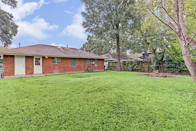 Possibilities are endless in this large backyard for entertaining, pets and play. Doors are conveni - 4609 Nina Lee Ln