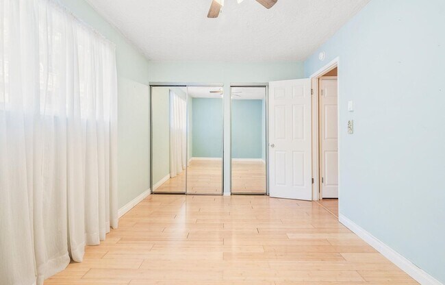 Building Photo - Spacious 2-Bedroom Condo with Forest Views, Private Balcony, In-Unit Laundry & Community Amenitie...