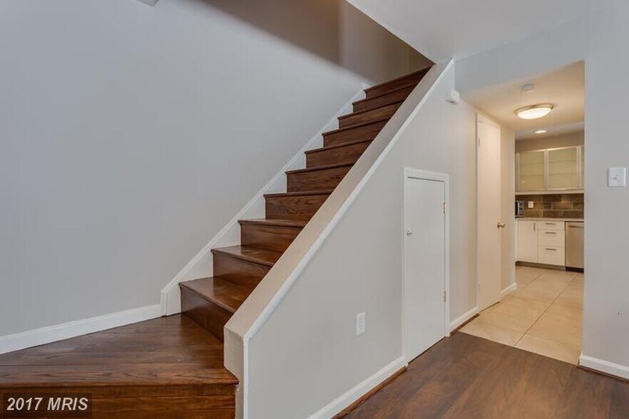 Stairs to upper level - 5735 Nordeen Oak Ct