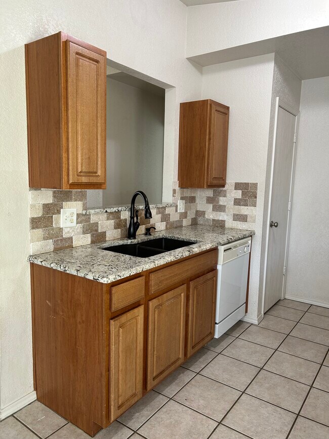 Kitchen with Granite - 9232 Snowberry Dr