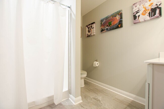 Building Photo - Pet Friendly Three Bedroom with Bonus!