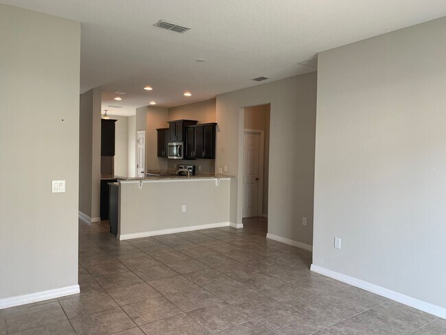 Building Photo - MOVE IN SPECIAL- 4/2.5 Energy Efficient Townhome in St. Cloud