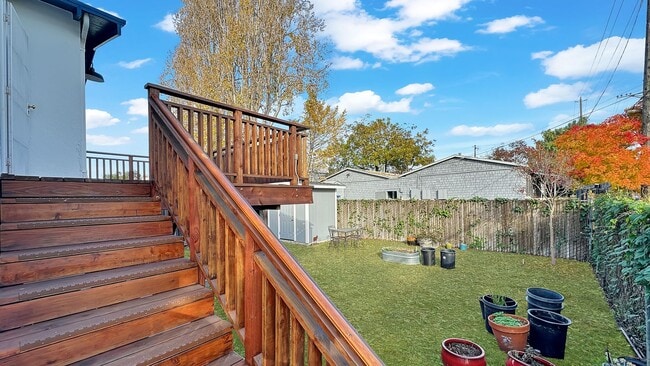 Building Photo - ALL UTILITIES INCLUDED - Remodeled - Upper Level - Backyard