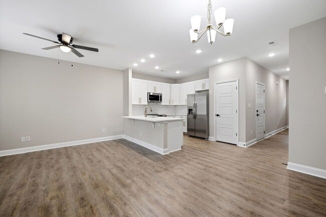 Building Photo - Luxury New 3BR Townhomes | Garage + Pool |...