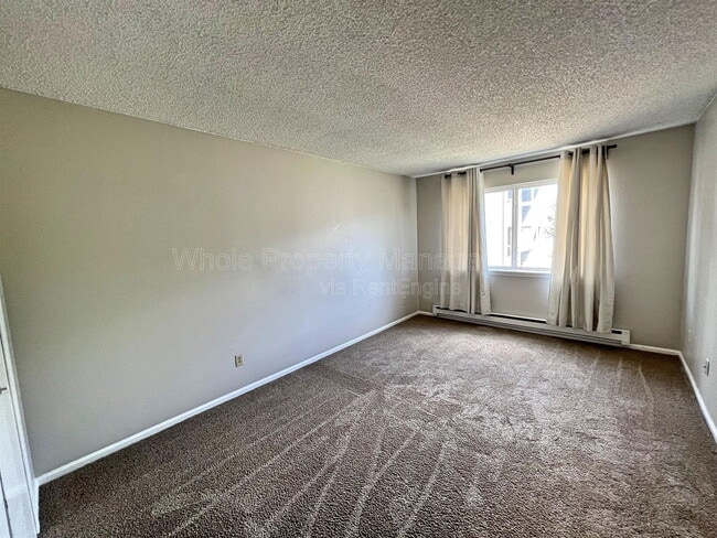 Building Photo - 8100 W Quincy Ave