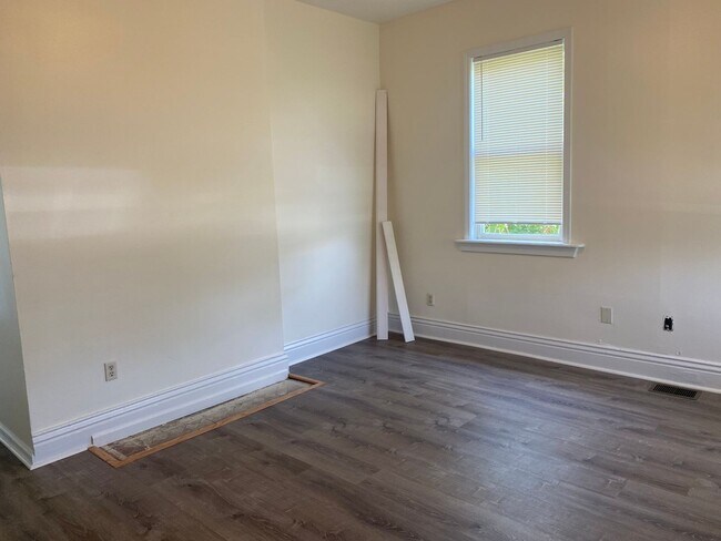 Building Photo - Updated three bedroom two bathroom home in...
