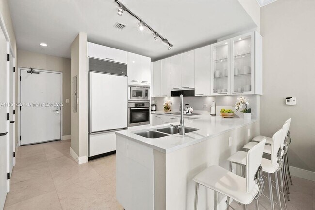 Building Photo - 6799 Collins Ave