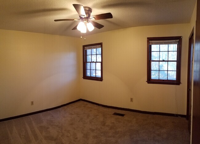 1st bedroom with lots of closet storage space. - 120 Colonial Ct