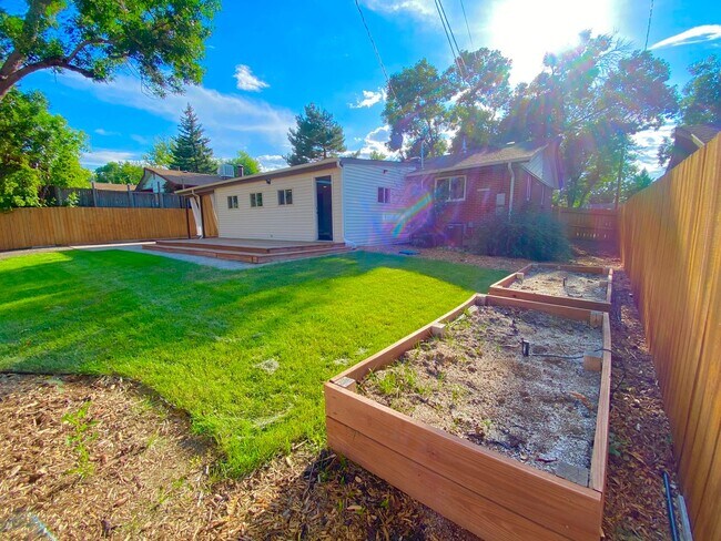 Building Photo - Spacious & Updated Home in Lakewood!-Open Floor plan, Outdoor Living Space, Garden Beds, & More!!!