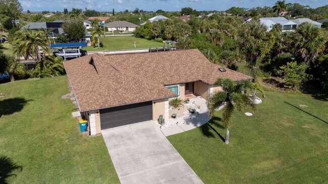 Building Photo - 3 BEDROOM • 2 BATHROOM • PRIVATE POOL • WATERFRONT • BOAT LIFT • ZERO DEPOSIT MOVE-IN AVAILABLE
