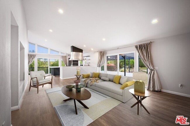 Building Photo - 8657 Valley Flores Dr